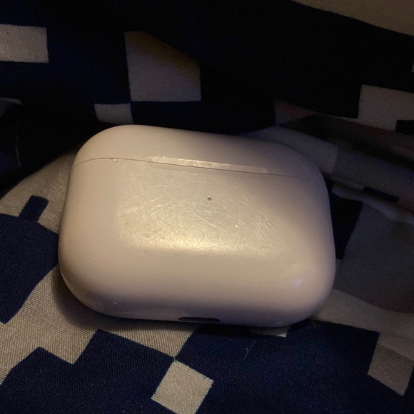White AirPods in good condition.